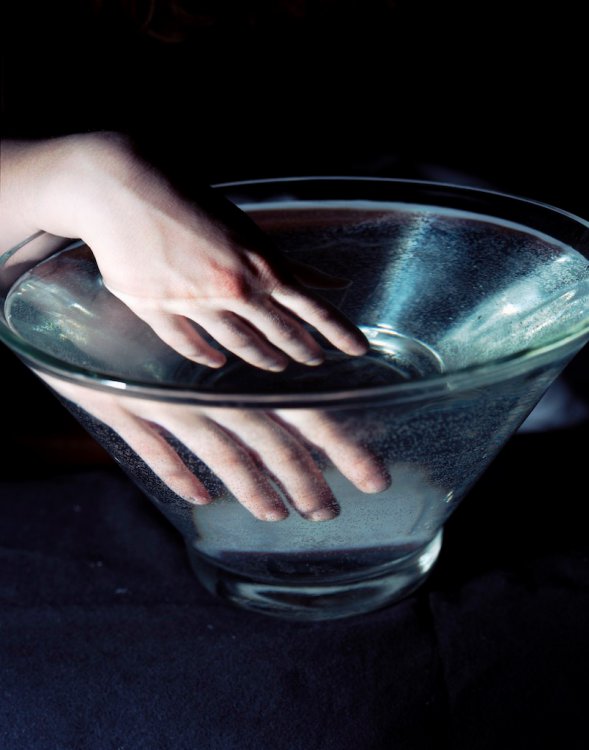 bowl and hand and water