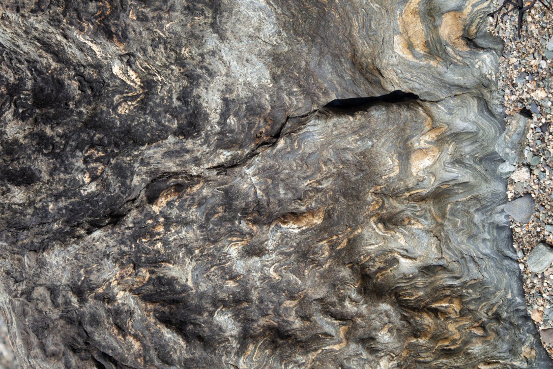 gray and colored rock with pebbles